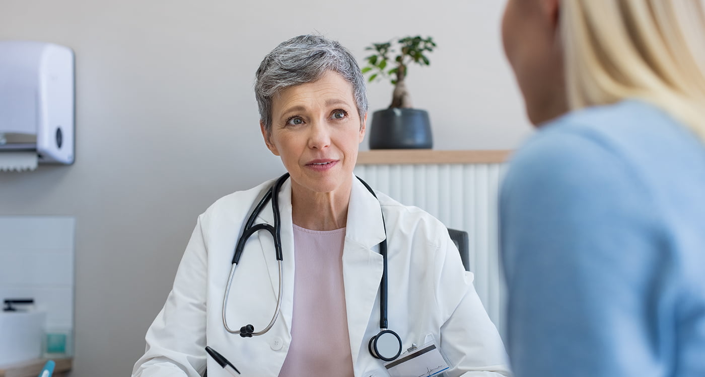 a doctor talking to her patient